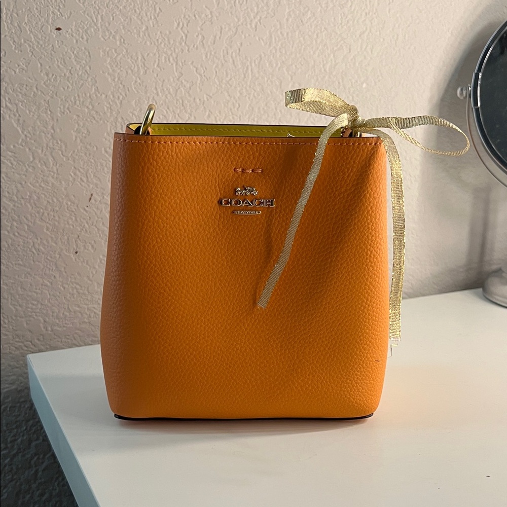 Coach Orange Mini Bucker Crossbody Bag with Gold Accents